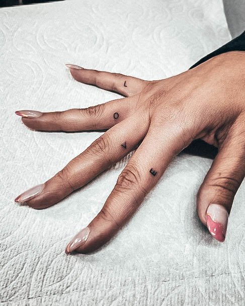 Girl With Feminine Black And White Tattoo