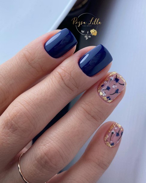 Girl With Feminine Blue And Gold Nail