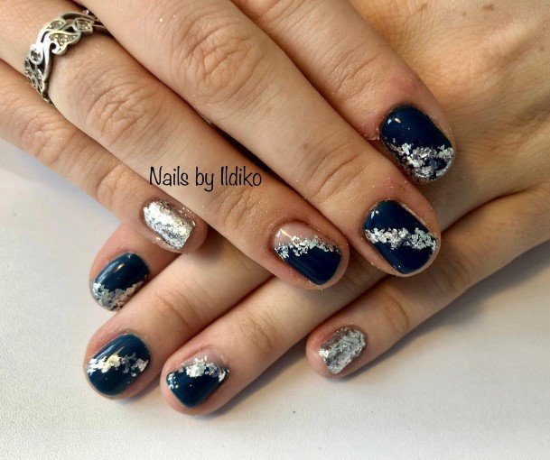 Girl With Feminine Blue And Silver Nail