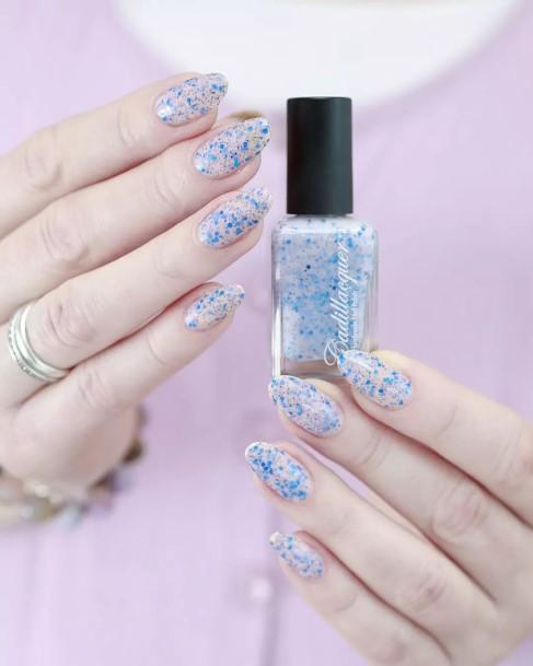 Girl With Feminine Blue Glitter Nail