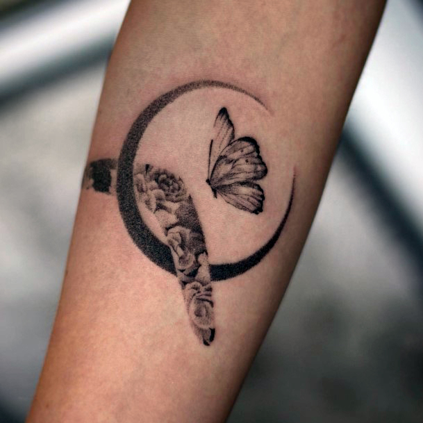 Girl With Feminine Boomerang Tattoo