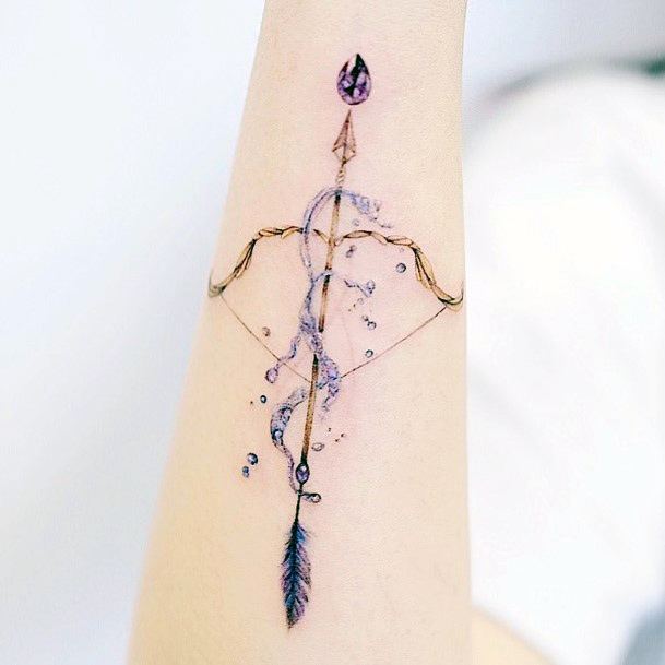 Girl With Feminine Bow And Arrow Tattoo