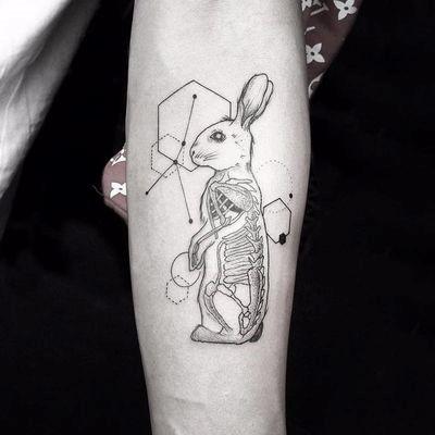 Girl With Feminine Bunny Rabbit Tattoo