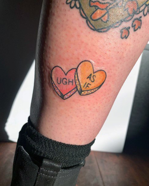 Girl With Feminine Candy Heart Tattoo