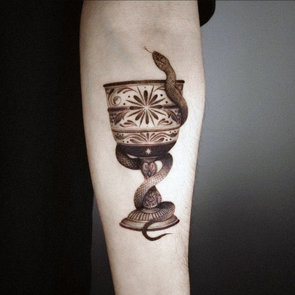 Girl With Feminine Chalice Tattoo