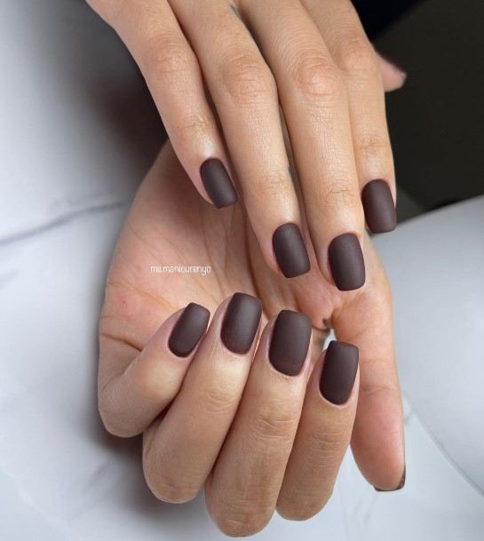 Girl With Feminine Dark Brown Nail