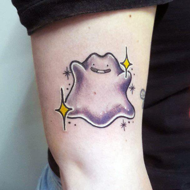 Girl With Feminine Ditto Tattoo