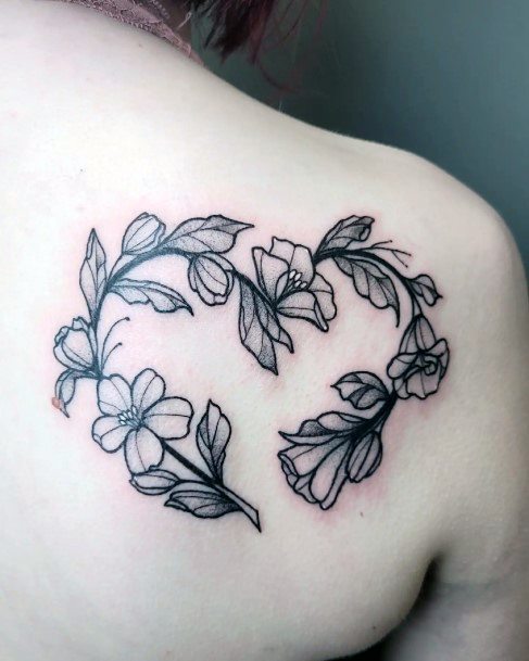 Girl With Feminine Flower Heart Tattoo