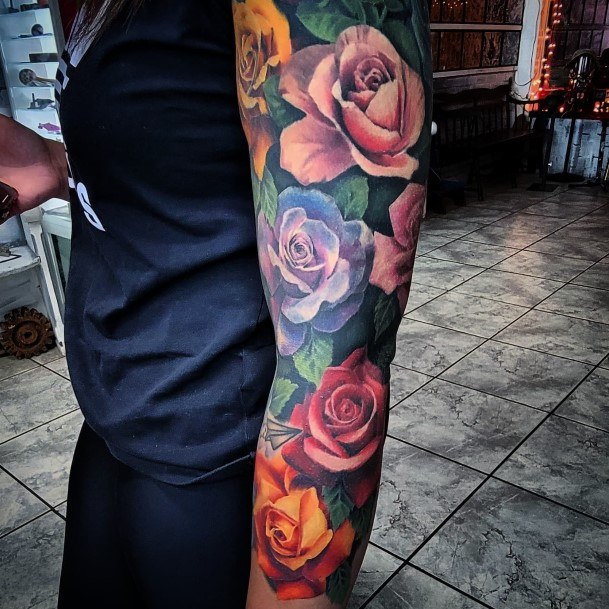 Girl With Feminine Flower Sleeve Tattoo