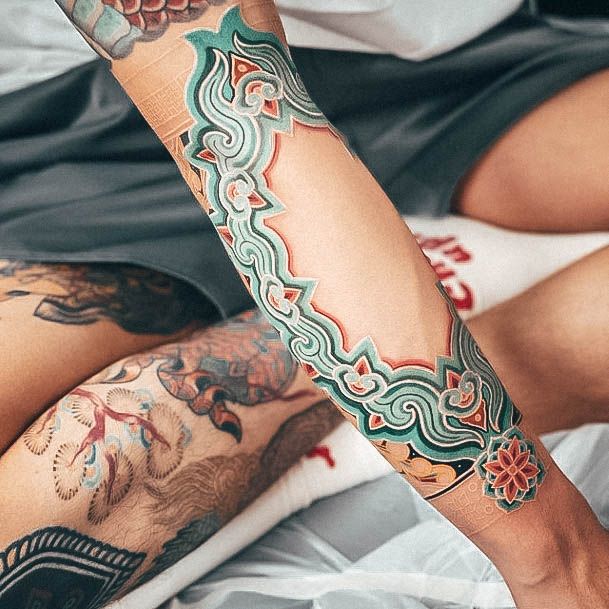 Girl With Feminine Forearm Sleeve Tattoo