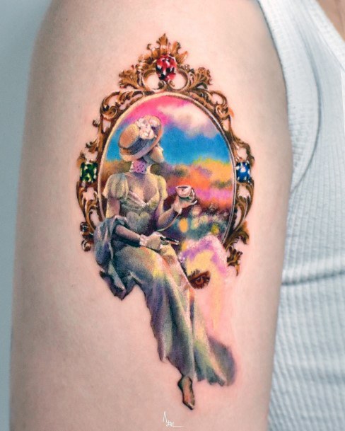 Girl With Feminine Frame Tattoo