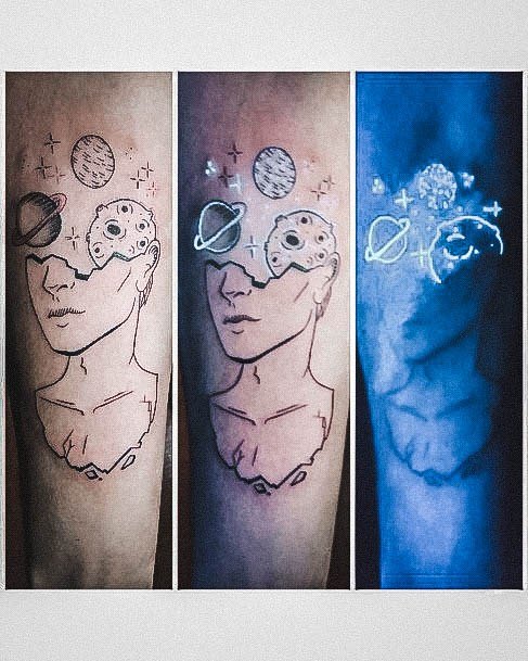 Girl With Feminine Glow In The Dark Tattoo