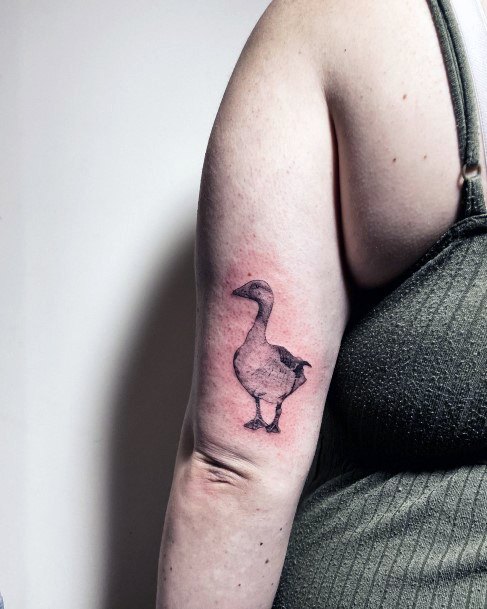 Girl With Feminine Goose Tattoo