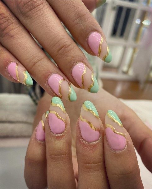 Girl With Feminine Green And Pink Nail