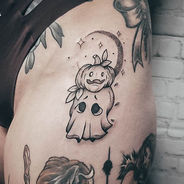 Girl With Feminine Halloween Tattoo