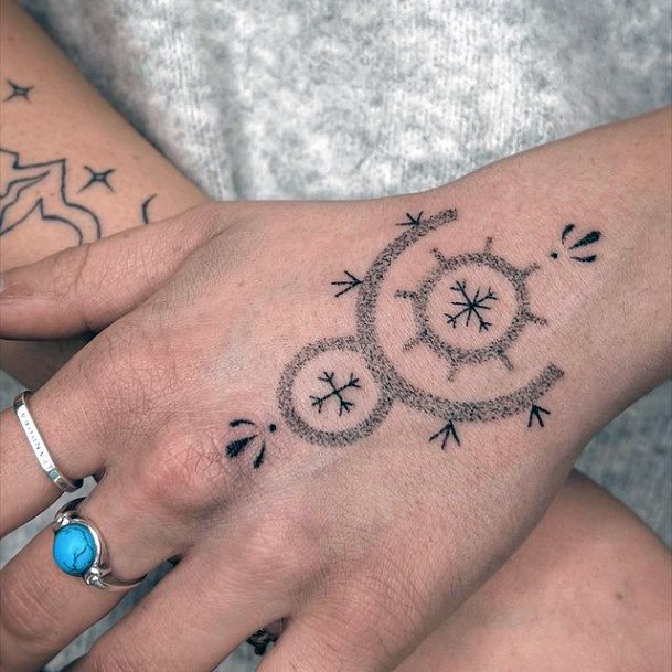 Girl With Feminine Handpoke Tattoo