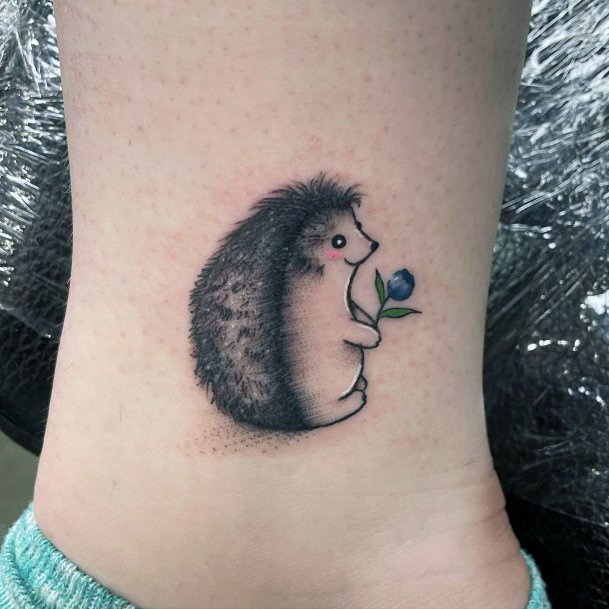 Girl With Feminine Hedgehog Tattoo