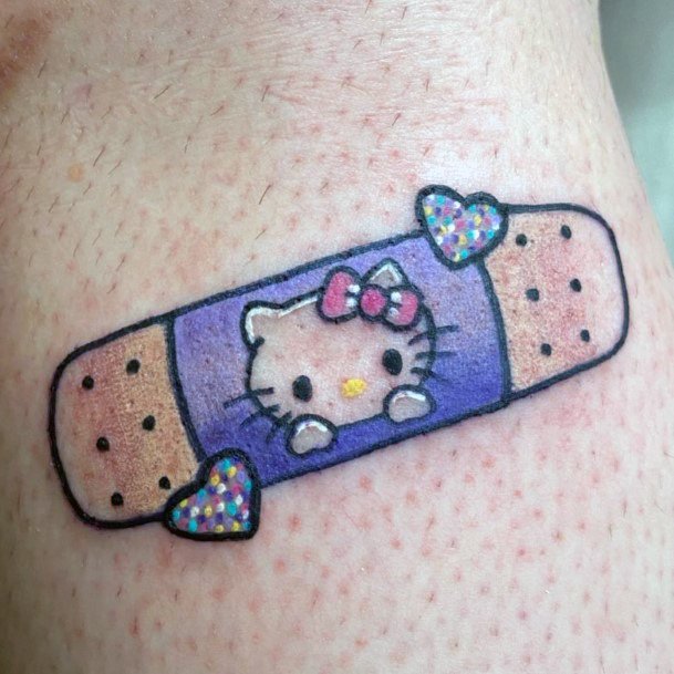 Girl With Feminine Hello Kitty Tattoo