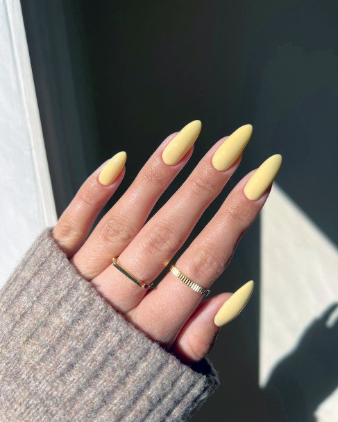 Girl With Feminine Light Yellow Nail