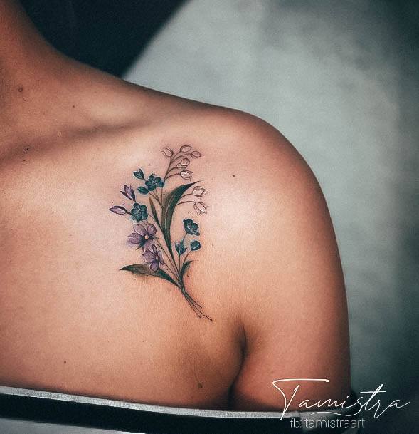 Girl With Feminine Lily Of The Valley Tattoo