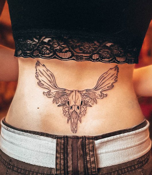 Girl With Feminine Lower Back Tattoo