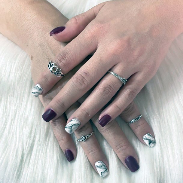 Girl With Feminine Maroon And Black Nail