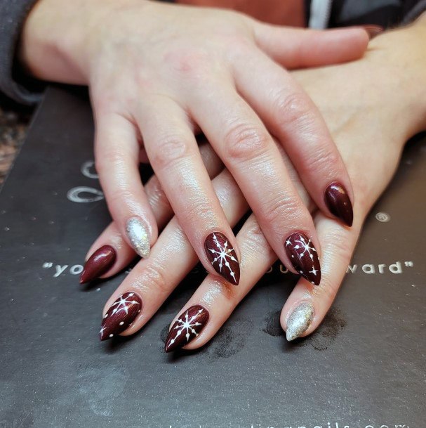 Girl With Feminine Maroon And Silver Nail