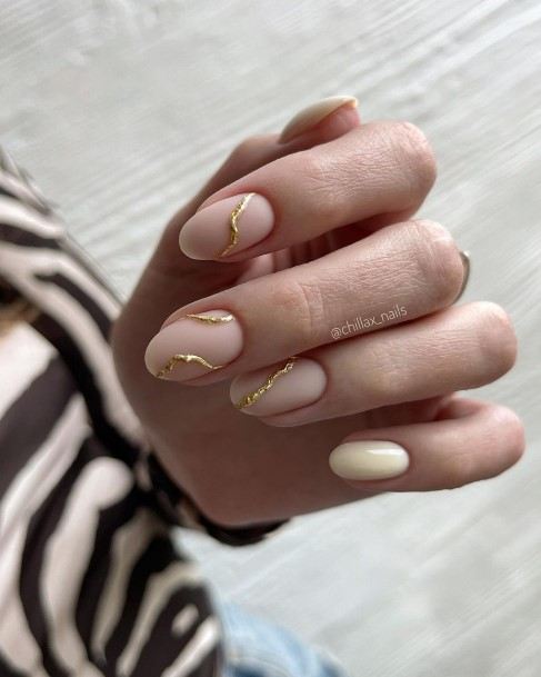 Girl With Feminine Metallic Gold Nail