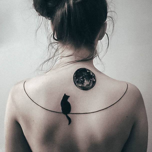 Girl With Feminine Moon Tattoo