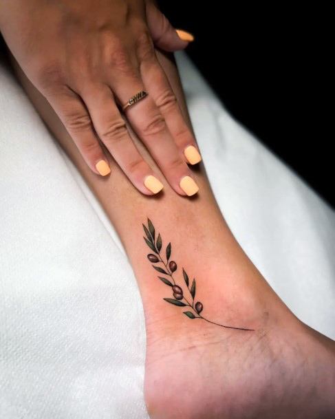 Girl With Feminine Olive Branch Tattoo