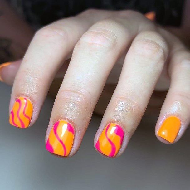 Girl With Feminine Orange Nail