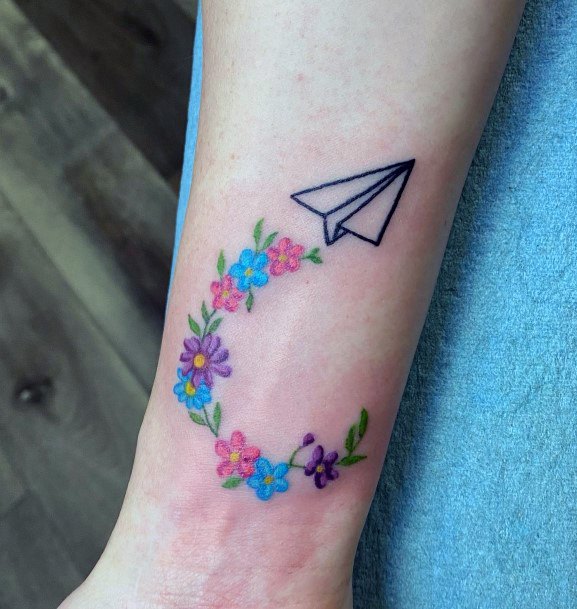 Girl With Feminine Paper Airplane Tattoo