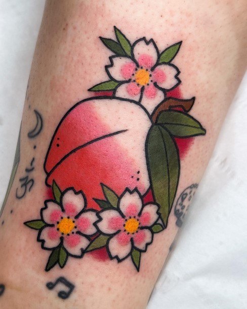 Girl With Feminine Peach Tattoo