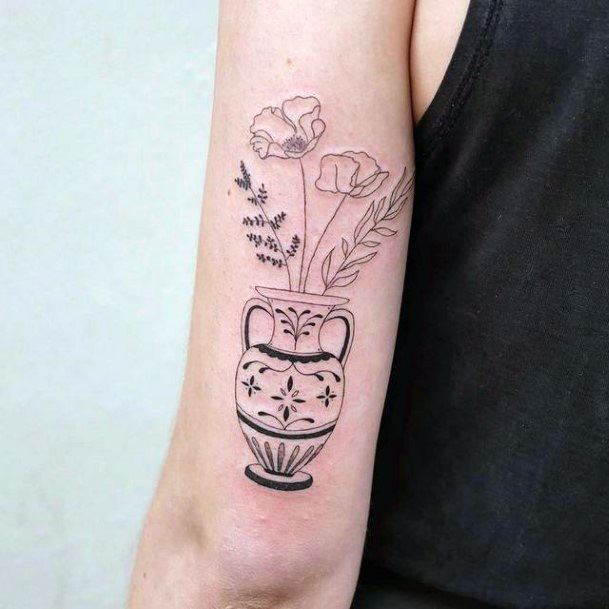 Girl With Feminine Pottery Tattoo