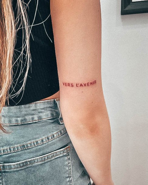 Girl With Feminine Red Ink Tattoo