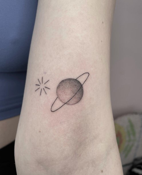 Girl With Feminine Saturn Tattoo