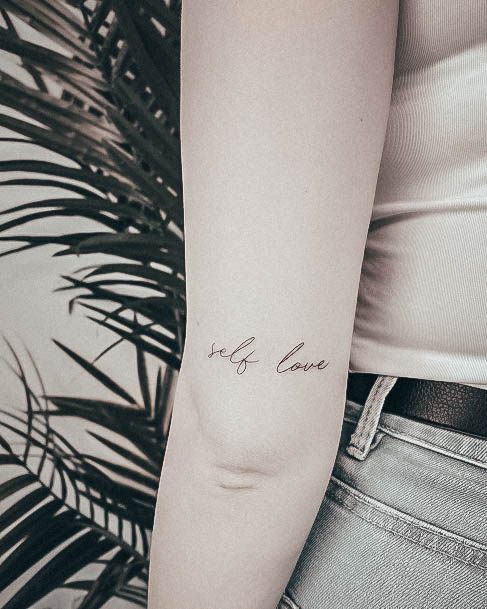 Girl With Feminine Self Love Tattoo