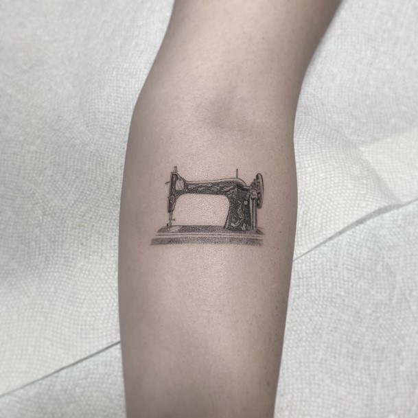 Girl With Feminine Sewing Machine Tattoo