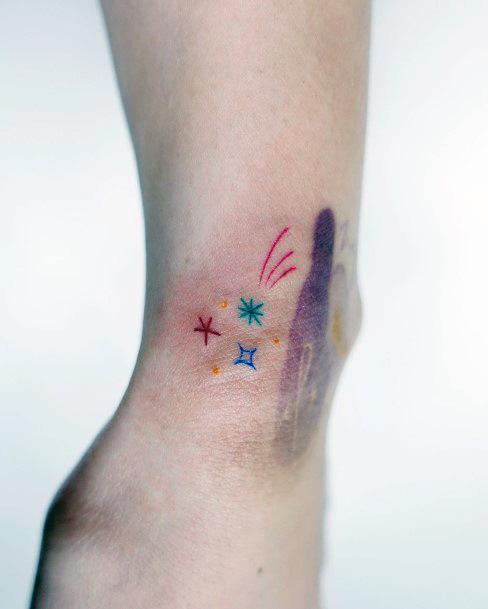 Girl With Feminine Shooting Star Tattoo