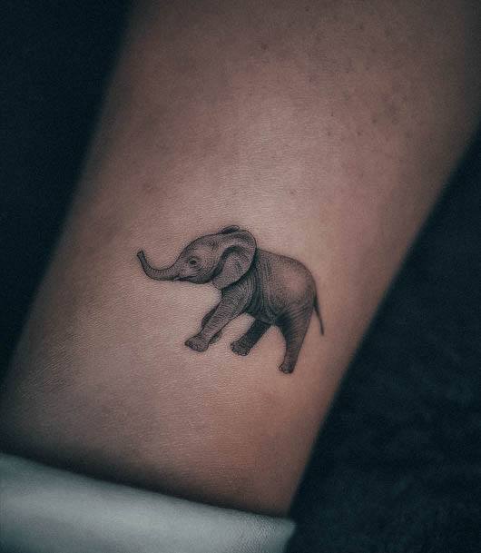 Girl With Feminine Small Elephant Tattoo