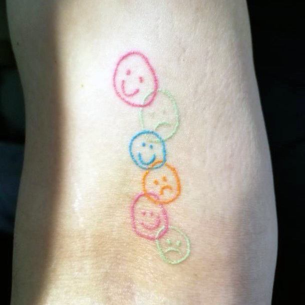 Girl With Feminine Smiley Face Tattoo