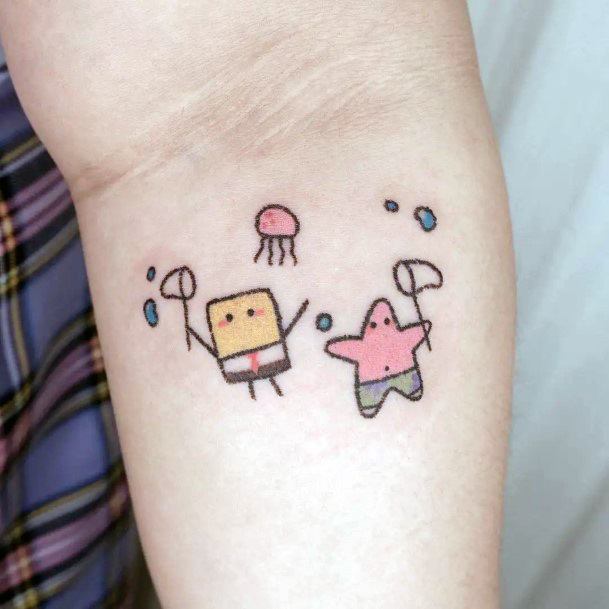 Girl With Feminine Spongebob Tattoo