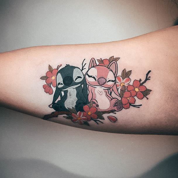 Girl With Feminine Stitch Tattoo