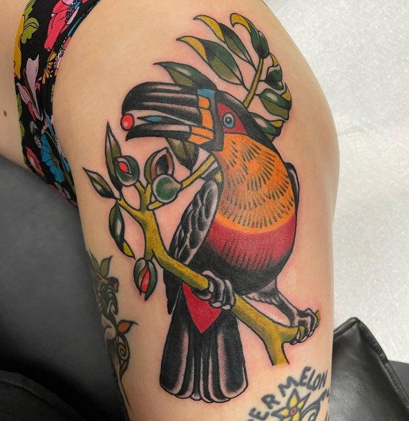 Girl With Feminine Toucan Tattoo