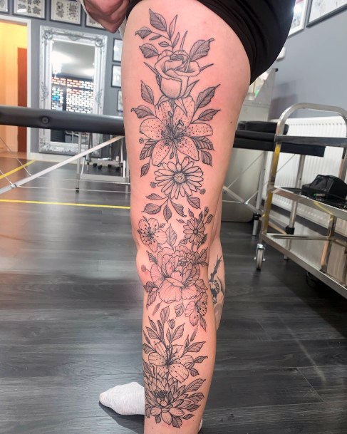 Girl With Feminine Water Lily Tattoo