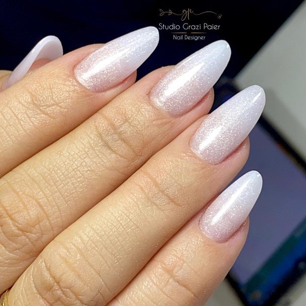 Girl With Feminine White Almond Shaped Nail