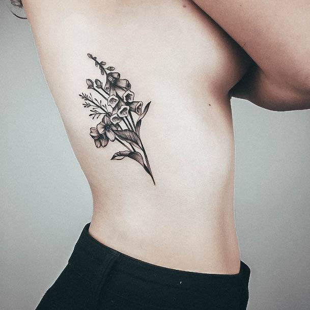 Girl With Feminine Wildflower Tattoo