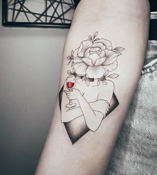 Girl With Feminine Wine Tattoo