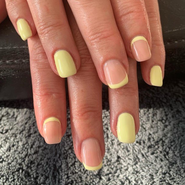 Girl With Feminine Yellow French Tip Nail