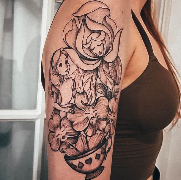 Girl With Graceful Alice In Wonderland Tattoos